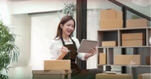 Happy entrepreneur celebrating first sale using the best platform to sell digital products.